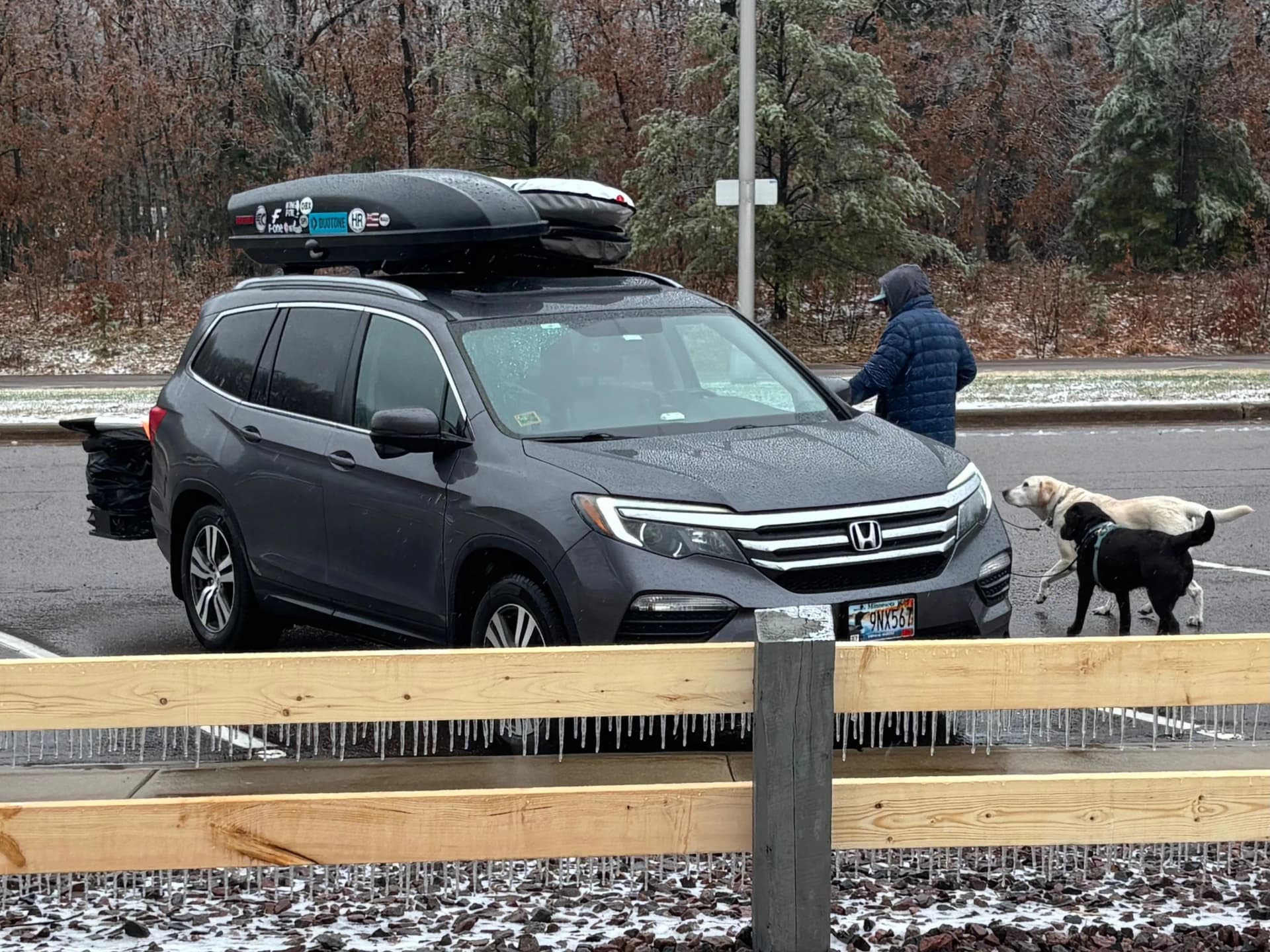 Icicles forming on the fences as we had pit stop around Euclaire WI