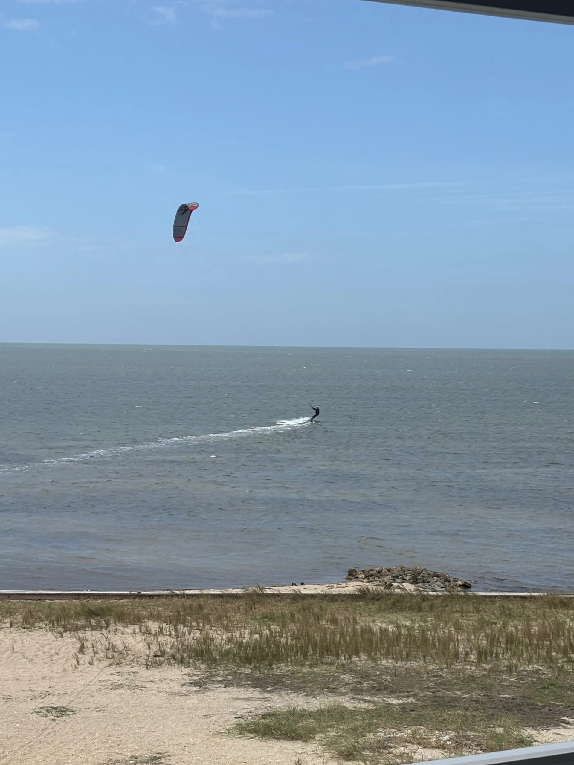 Baskin riding the 11m AV8 and surf board during lunch hour break