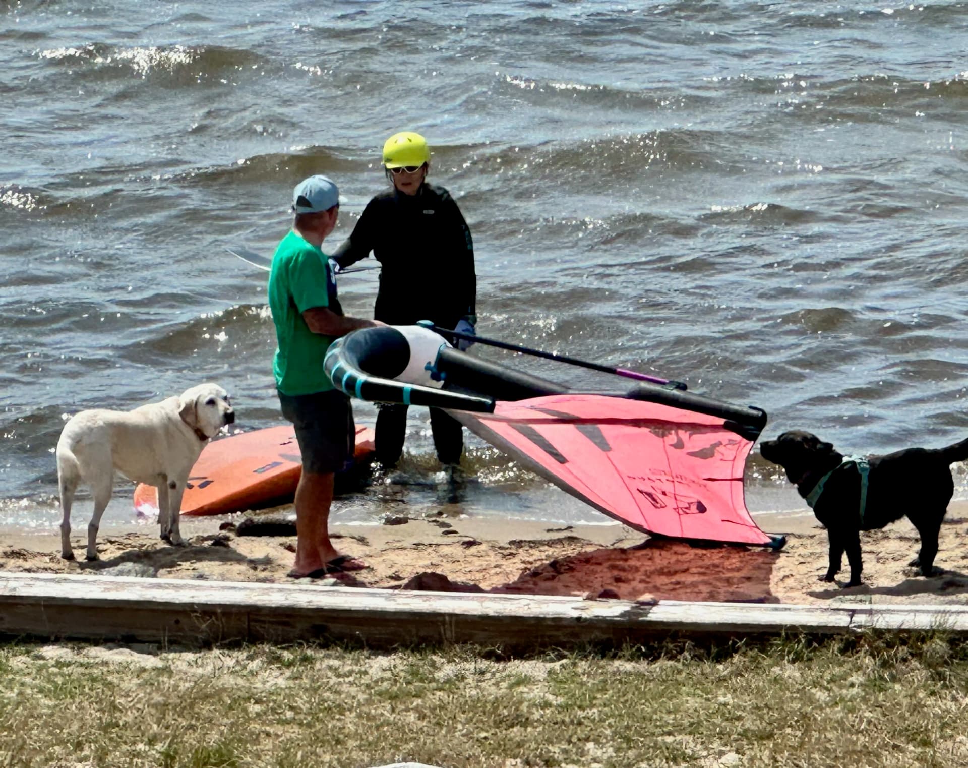 Baskin is greeting Kelly after her session, getting feedback while Tucker and Zoey are observing