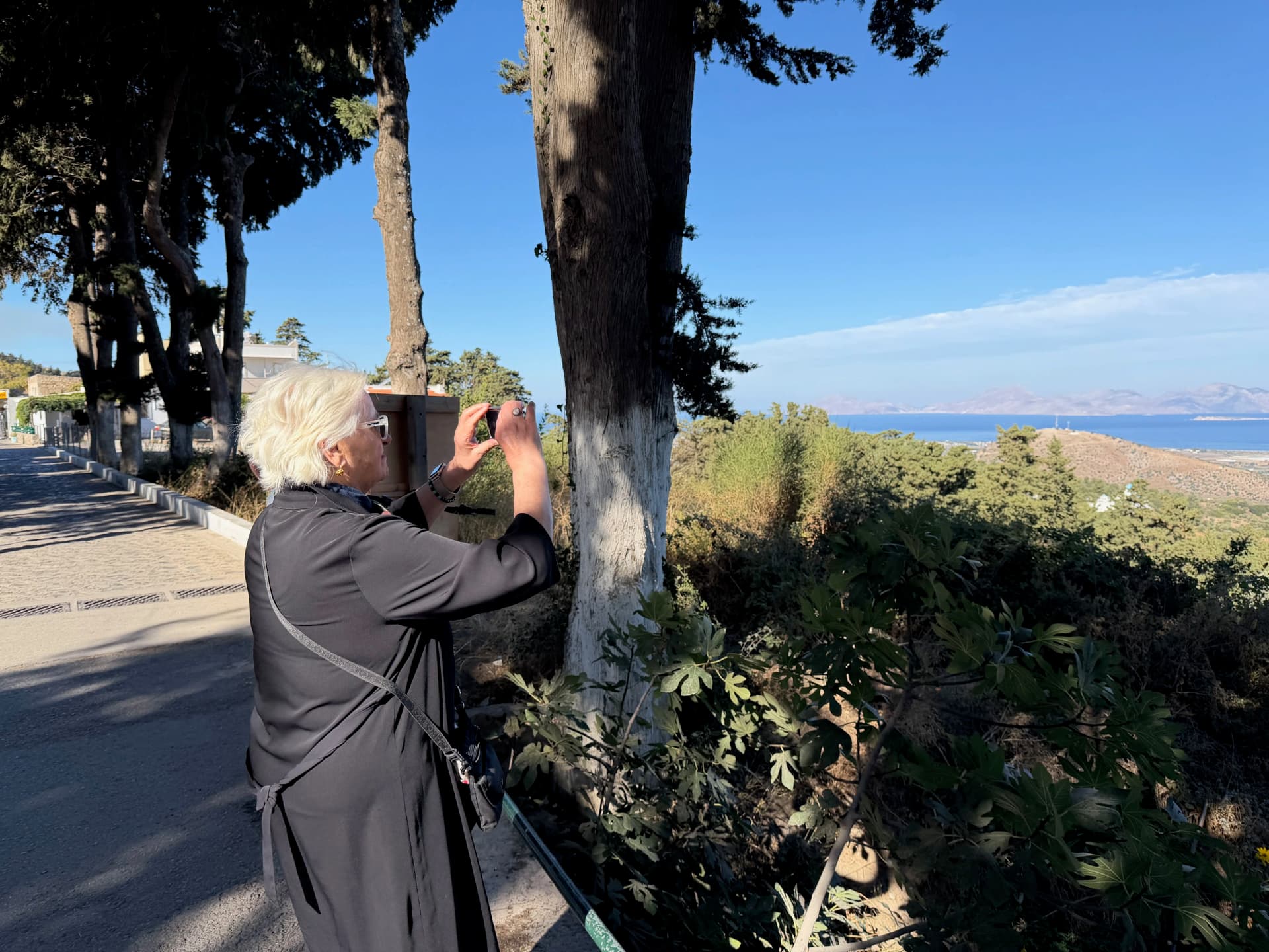Nefis taking a picture from the top of Zia - quiet and scenic