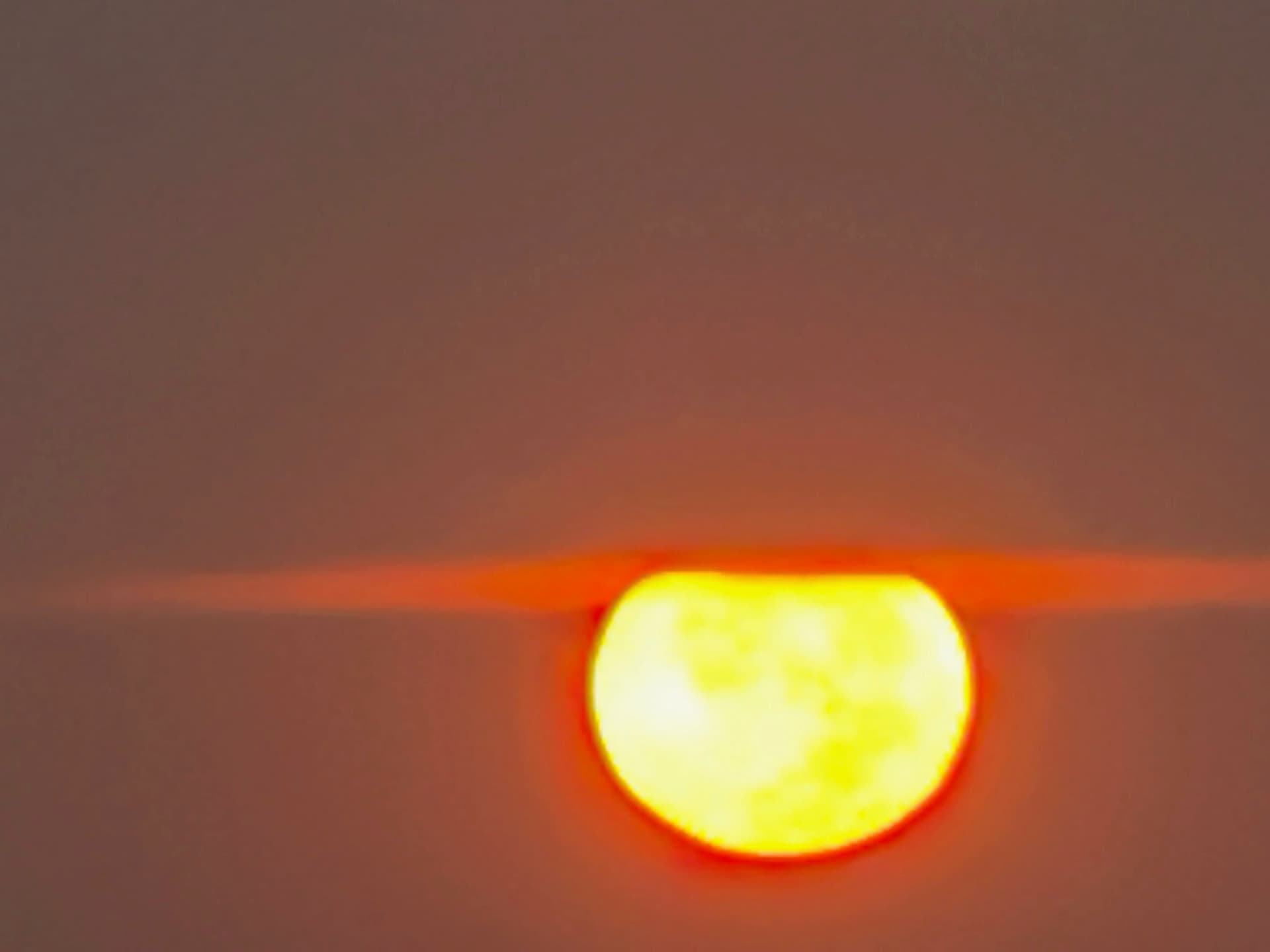 moon and sun went down from almost the same location in the horizon