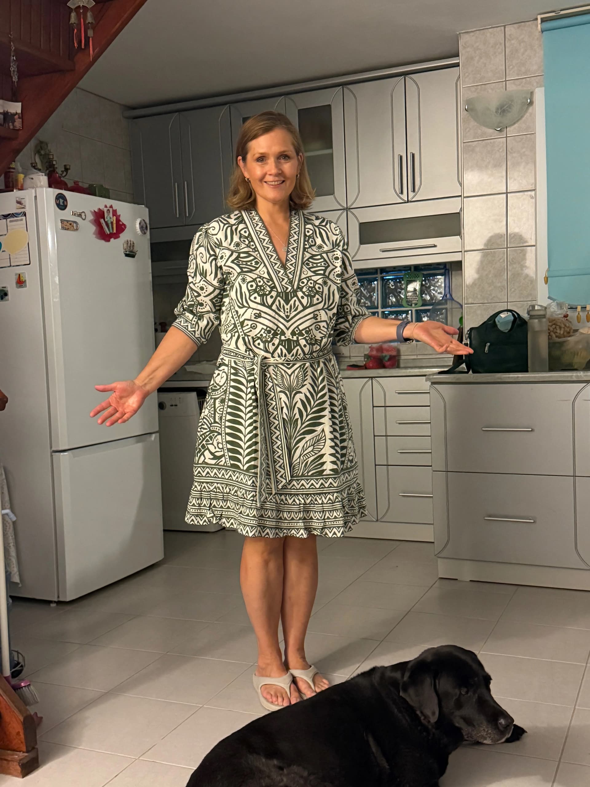 Kelly posing with her dress - she looks amazing!
