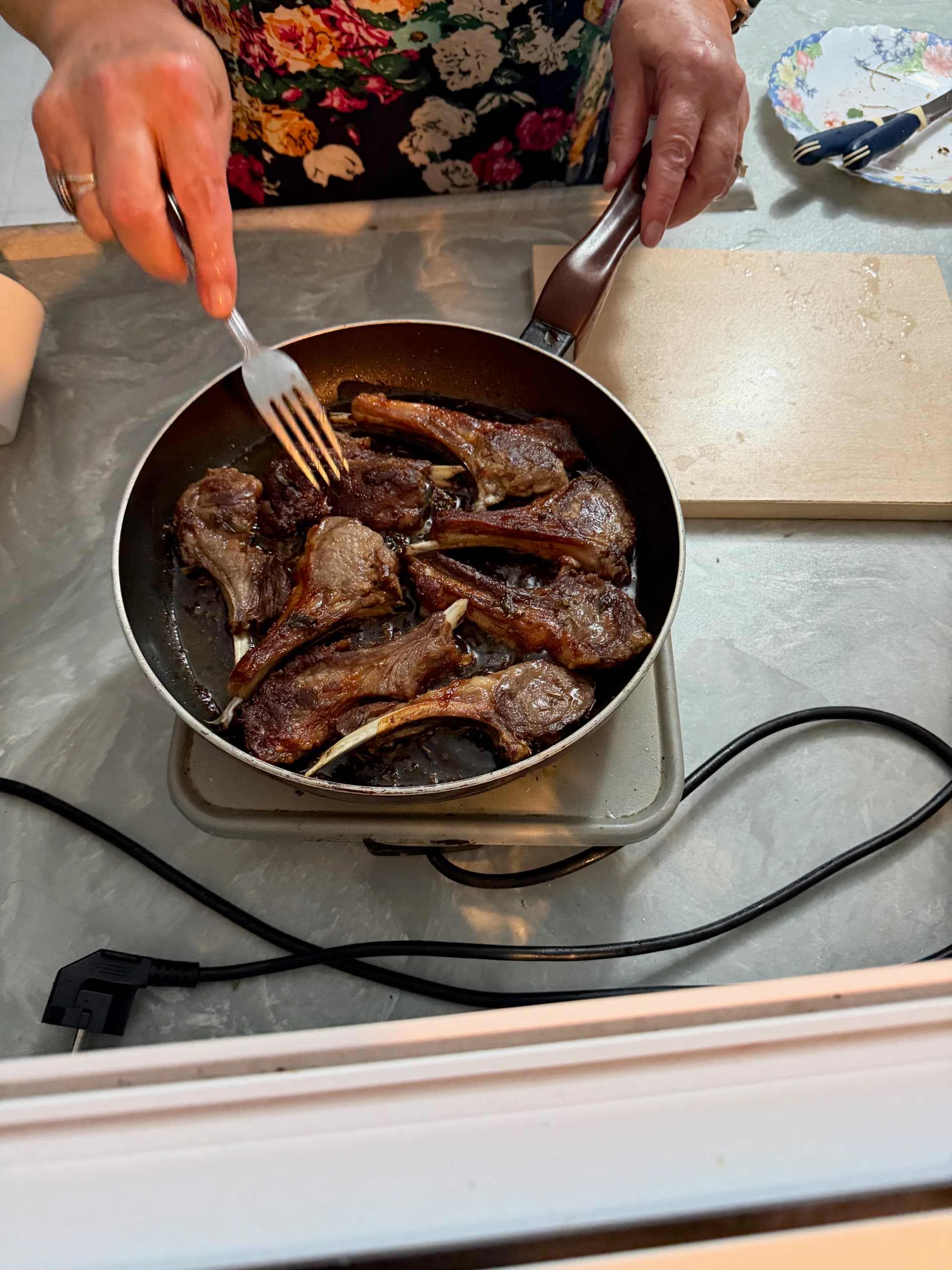 Nefis handling the lamp chops - so good