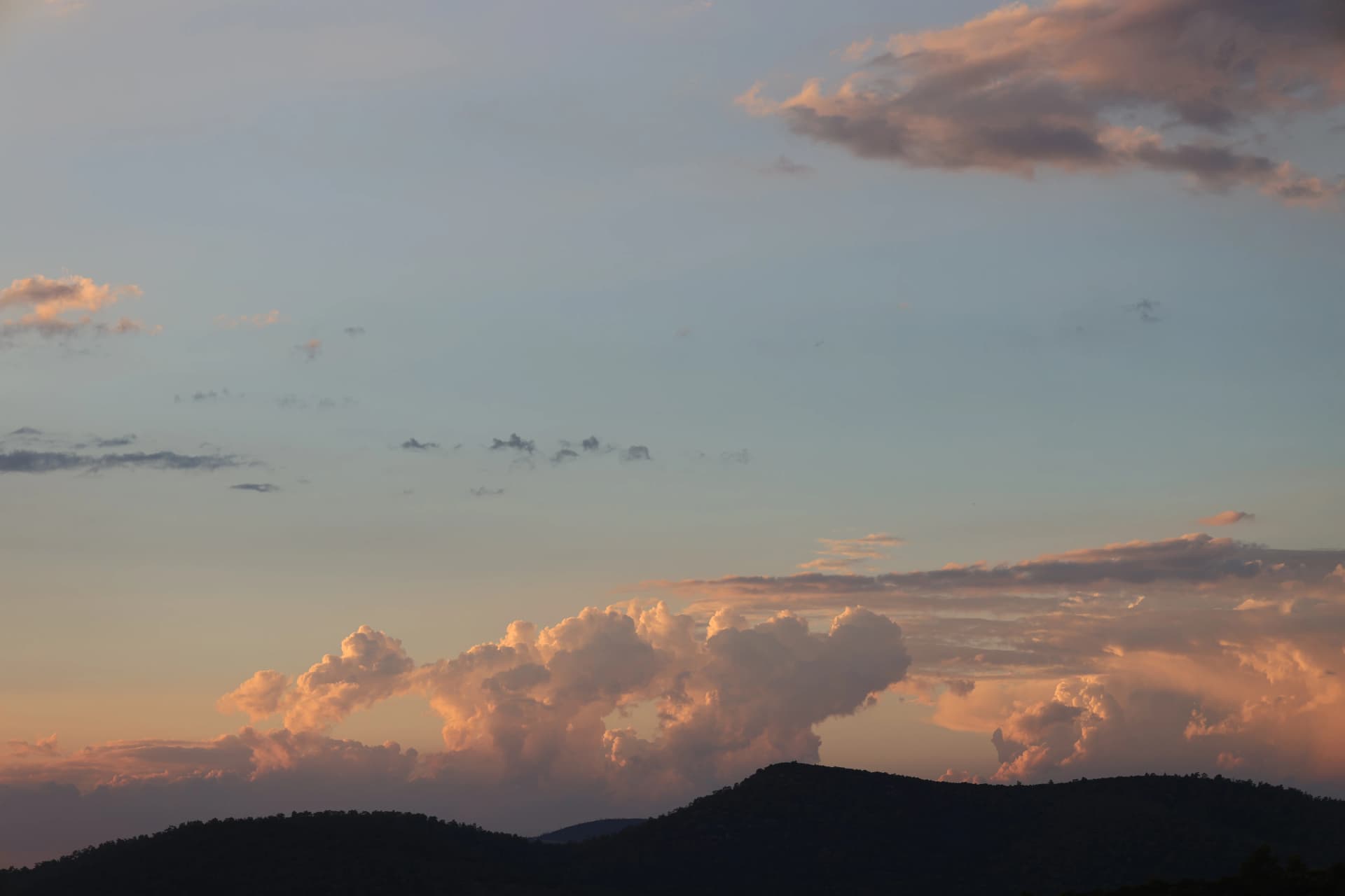 Some clouds but blue skies