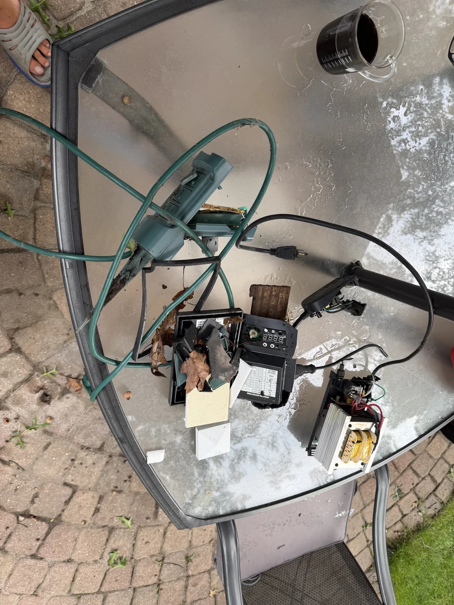 Aug 9, 09:59 - broken outdoor transformer and outlet pieces